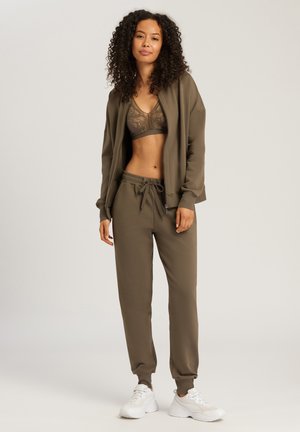 LIVING - Tracksuit bottoms - olive