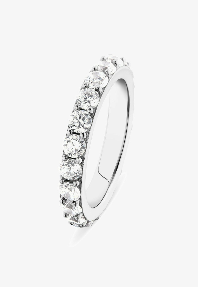 White gold ring featuring a series of round, clear gemstones set in a row, with a polished smooth band and prong details.