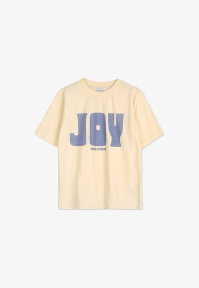 Yellow cotton T-shirt featuring a blue "JOY" graphic print in bold letters. Short sleeves and a classic crew neck design.