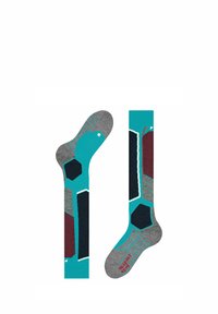 Chaussettes colorées avec une base turquoise, ornées de motifs géométriques gris, bleu foncé et bordeaux. Texture douce et formes contrastées.