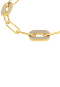 Bracciale in oro e argento caratterizzato da anelli ovali intrecciati, superficie liscia e finitura lucidatura con toni a contrasto.