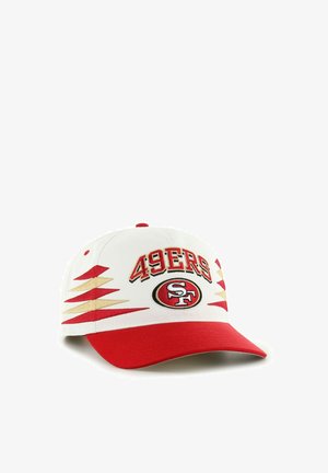 White and red baseball cap with "49ERS" text and San Francisco 49ers logo, featuring red and gold lightning bolt designs on sides.