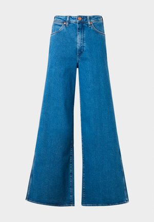 Jeans in denim blue a gamba larga con vita alta, dotati di tasche frontali, chiusura a bottone e una texture leggera. Finitura pulita e cuciture.