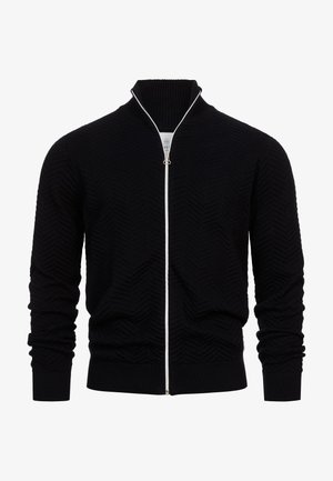 Cardigan negru cu fermoar, cu un model texturat de herringbone, guler și mansete ribbate, având un fermoar argintiu și un talie elasticizată.