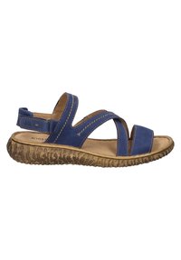 Blå lædersandal med krydsede remme, polstret sål og struktureret gummisål. Dekorative syninger på overdelen.
