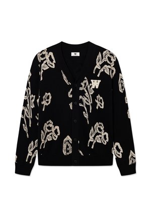 Čierny kardigán s bielym kvetinovým vzorom, so špicatým výstrihom, zapínaním na gombíky a logom na hrudi. Vyrobený z mäkkého materiálu.