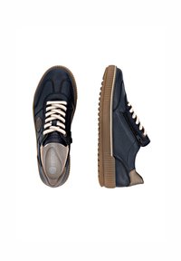 Navy leather sneakers with beige accents, textured rubber sole, and contrasting laces. Includes side zipper for easy access.