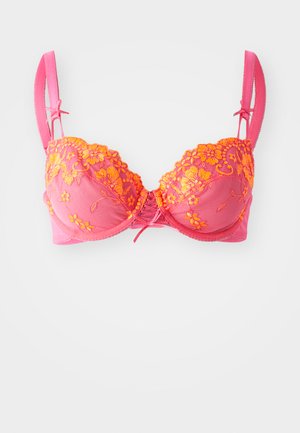 Pink bra featuring floral embroidery in orange. Underwire style with silky texture. Adjustable straps with a bow detail at the center.