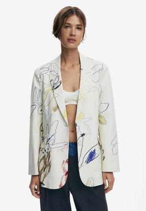 White blazer with colorful floral patterns in blue, yellow, and brown. Features a relaxed fit, notched lapels, and two front pockets.