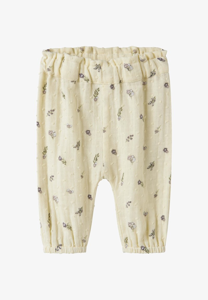 Miękkie, kremowe spodnie dla niemowląt z drobnym fioletowo-zielonym nadrukiem kwiatowym, elastycznym pasem i ściągaczami przy kostkach.