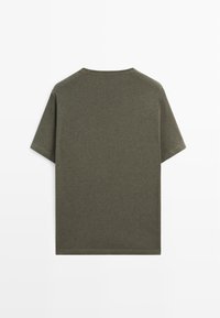 Olive green short-sleeve T-shirt made from cotton, featuring a crew neck and a relaxed fit. The fabric has a slightly textured appearance.