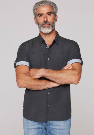 Short-sleeve shirt in dark gray fabric with a subtle texture, featuring a light blue striped cuff and contrasting collar accents.