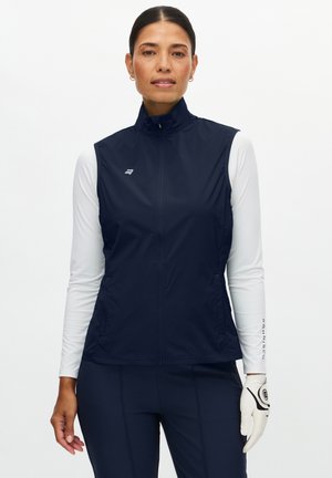 Gilet senza maniche blu navy con collo alto, realizzato in tessuto liscio. Presenta una cerniera frontale e un piccolo logo sul petto.