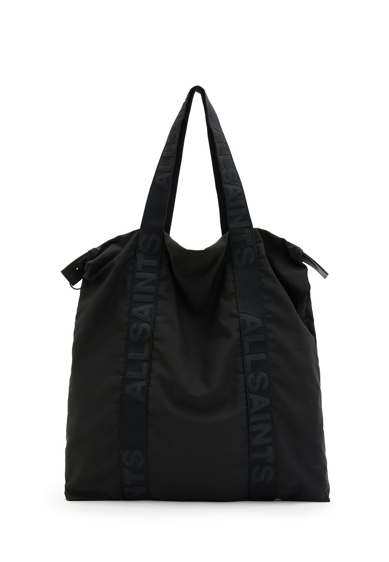 Black nylon tote bag with dual fabric handles, featuring textured logo straps and a zipper closure at the top. Soft, unstructured design.