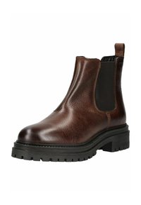 Botas de tobillo de cuero marrón con paneles laterales elásticos, punta redondeada y suela de goma negra gruesa con textura para mayor agarre.