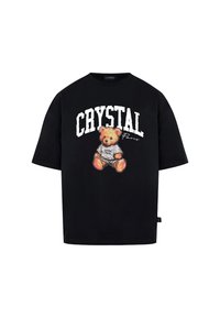 Černé oversize tričko z bavlny s grafikou medvídka a textem "CRYSTAL Paris" v bílé barvě nad a pod ním.