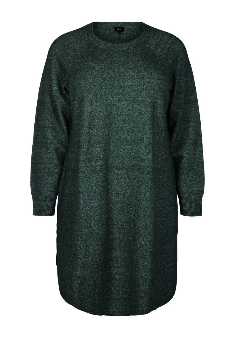 Abito maglione oversize a maniche lunghe di colore verde scuro, realizzato in un materiale a maglia testurizzato, con scollatura rotonda e fessure laterali all'orlo.
