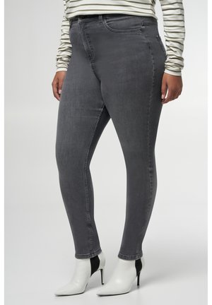 Grijze denim skinny jeans met een soepele textuur, voorzien van een middelhoge taille, subtiele stikdetails en een getailleerde pasvorm.