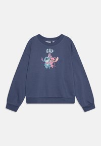 Felpa blu navy con collo rotondo, caratterizzata da una grafica colorata di due personaggi dei cartoni animati e la parola "GAP" sopra di essi.