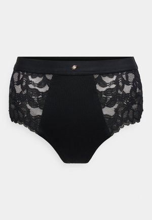 Cueca preta de cintura alta com painel lateral de renda transparente, tecido macio, bordas onduladas e um pequeno detalhe decorativo dourado.