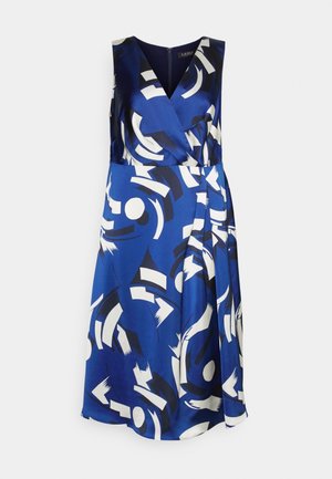 Sleeveless blue dress with wrap style, abstract white and black geometric prints, and V-neckline, displayed on a plain background.