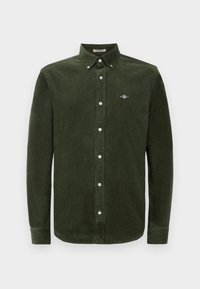 Donkergroene corduroy overhemd met een button-down kraag, lange mouwen en witte knopen. Bevat een klein geborduurd logo op de borst.