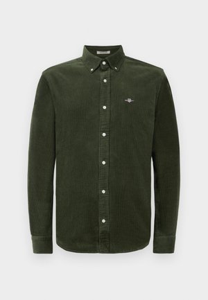 Donkergroene corduroy overhemd met een button-down kraag, lange mouwen en witte knopen. Bevat een klein geborduurd logo op de borst.