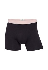 Sorte boxer shorts lavet af blødt stof med en lyserød elastik, der bærer brandnavnet. Har en glat tekstur og en tætsiddende design.