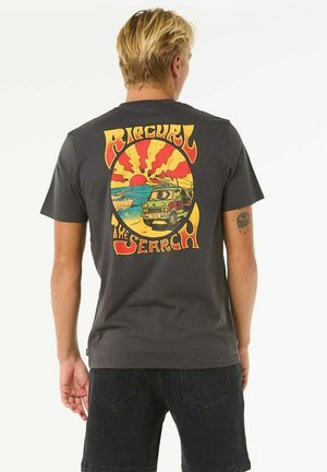 Gray cotton t-shirt featuring a colorful retro print on the back, depicting a van, beach, and sunburst design with the text "RIP CURL THE SEARCH."