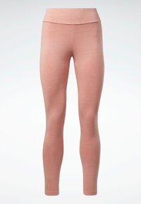 Rózsaszín leggings, puha textúrával, magas derékkal és testhez simuló kialakítással. Az anyag rugalmasnak és simának tűnik, látható minták nélkül.