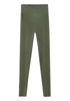 Olīvu zaļas augsta jostas vietas bezšuvju legingi ar plašu jostas daļu, potītes garuma, izgatavoti no elastīga auduma.