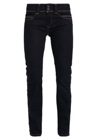 Jeans de mezclilla azul oscuro con un corte ajustado, que cuentan con cinco bolsillos, costuras amarillas en contraste y cierre de botón.