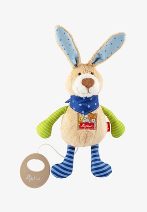 Plush beige bunny with blue polka-dot ears, green striped arms, blue striped legs, star-patterned scarf, and attached beige pull ring.