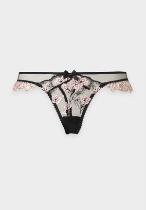 String en dentelle noire transparente avec broderie florale rose et un petit nœud noir au centre devant.