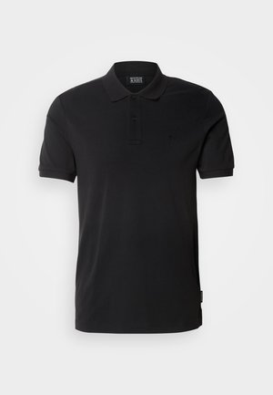 Polo shirt noir en coton, doté d'un col classique, d'une patte de boutonnage à trois boutons, de manches courtes et d'un logo discret sur la poitrine.
