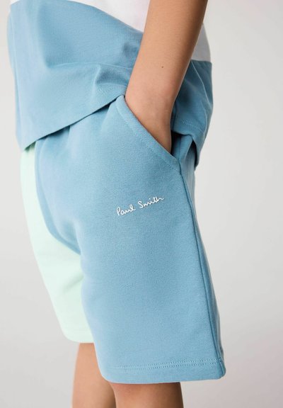 Modré bavlnené šortky s kontrastnou mätovo zelenou panelou, s bočnou vreckom a bielym vyšívaným logom "Paul Smith". Jemný povrch.