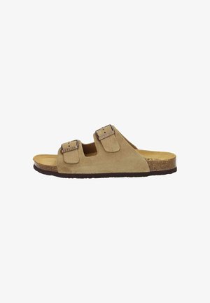 Beige suede slide sandal with two adjustable straps and metal buckles, cork footbed, and rubber sole. Flat design with an open toe.