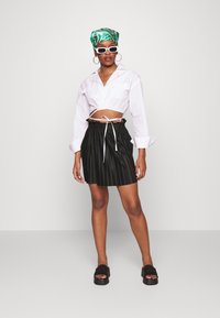 Even&Odd Petite Minissaia - black