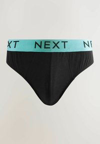 Svart kalsonger med ett turkos elastiskt midjeband som har ordet "NEXT" i fet svart text. Slät tyg och åtsittande design.