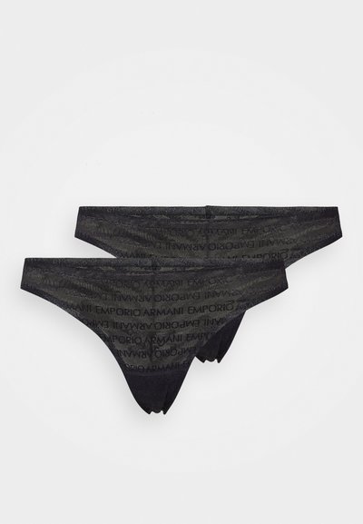 Μαύρο στρινγκ εσώρουχο φτιαγμένο από μαλακό και ελαστικό ύφασμα, με αναπαραγωγικό μοτίβο λογότυπου EMPORIO ARMANI κατά μήκος της ζώνης.