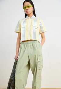 Columbia SANDIER™ PARACHUTE PANT - Cargohose - safari