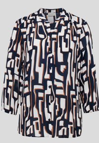 Navy- und weiße Bluse mit geometrischen Mustern in braunen Akzenten. Verfügt über eine durchgehende Knopfleiste, einen Kragen und Dreiviertelärmel. Weicher Stoff.