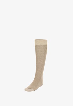 Beige kniekous met een lichtbeige band aan de bovenkant. Gemaakt van zachte, gestructureerde stof en heeft een naadloos teenontwerp.