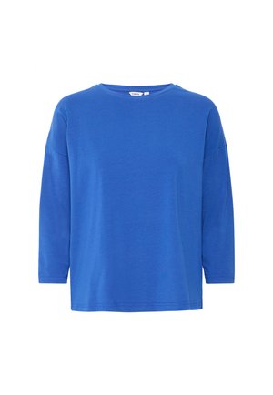 Chemise bleu à manches longues en coton doux, avec un col rond, une coupe décontractée et des manches trois-quarts. Design simple en couleur unie.