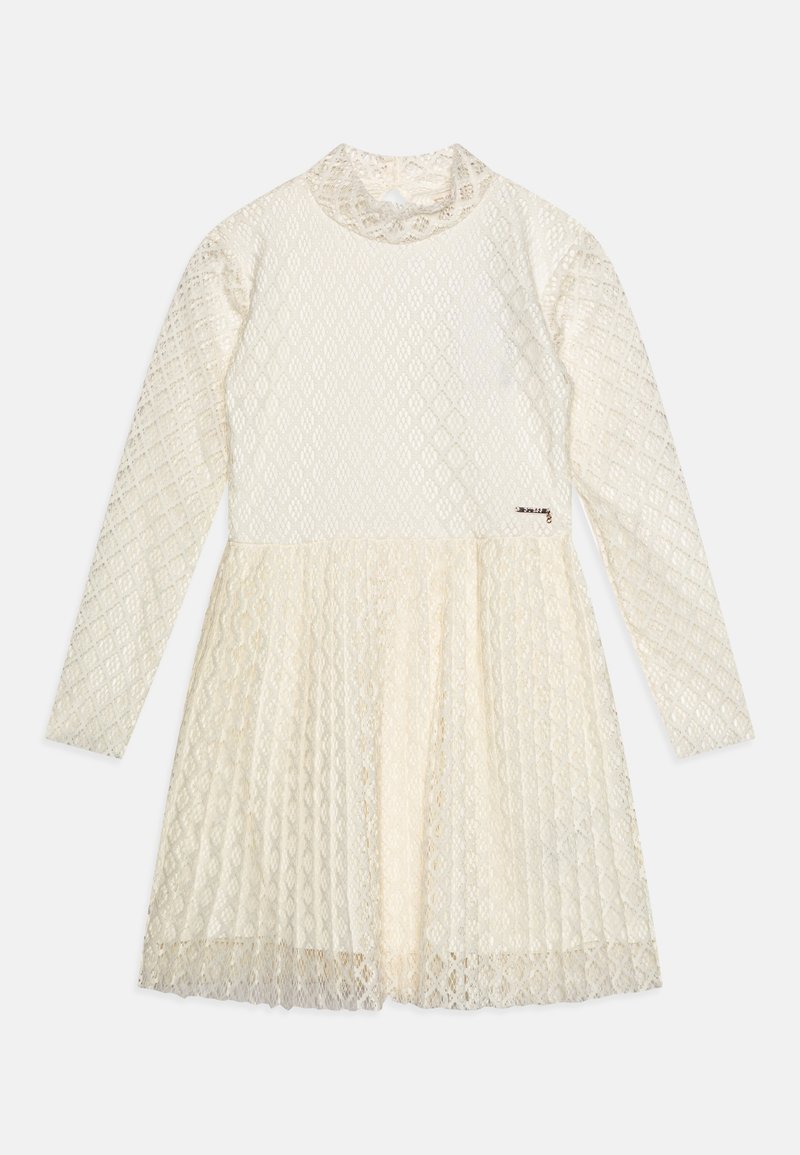 Dlouhý rukáv šatů z krémové krajky, s diamantovým vzorem, s polo-stojáčkem a rozšířenou sukní. Obsahuje malý kovový detail blízko lemu.