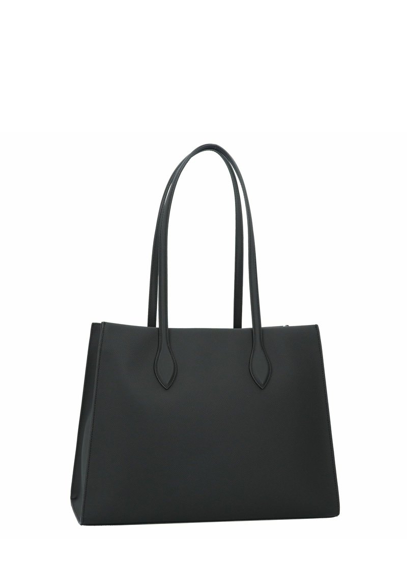 Sac fourre-tout noir en matériau texturé avec deux longues poignées et une forme structurée. Présente des coutures discrètes et aucun matériel visible.