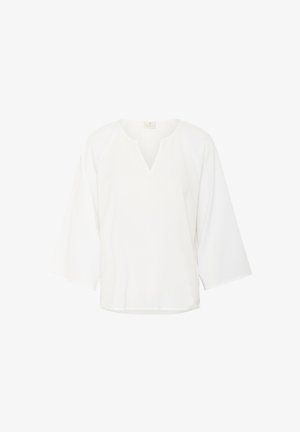 Bela, široka majica s V-izrezom, s tri četvrtinami rukavov in teksturirano tkanino. Vključuje raglan ramene šive za dodatno udobje.