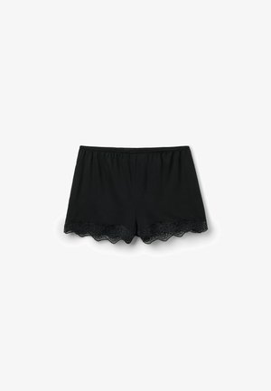 Black women's shorts with elastic waistband and scalloped lace trim along the hem against a white background.