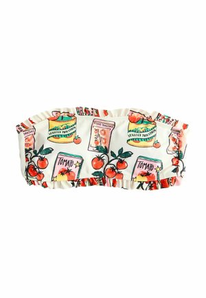 Strapless, tætsiddende top med hvid baggrund, prydet med farverige illustrationer af tomatdåser og en flæset kant.