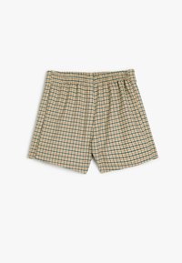 Boxershort in een geruit patroon, met groene en bruine tinten, een elastische tailleband en een losse pasvorm, gemaakt van lichtgewicht stof.